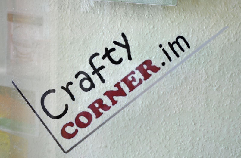 Crafty Corner.im glass door